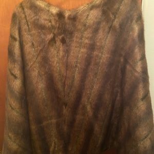 Pullover cape with matching wrap. Faux fur
